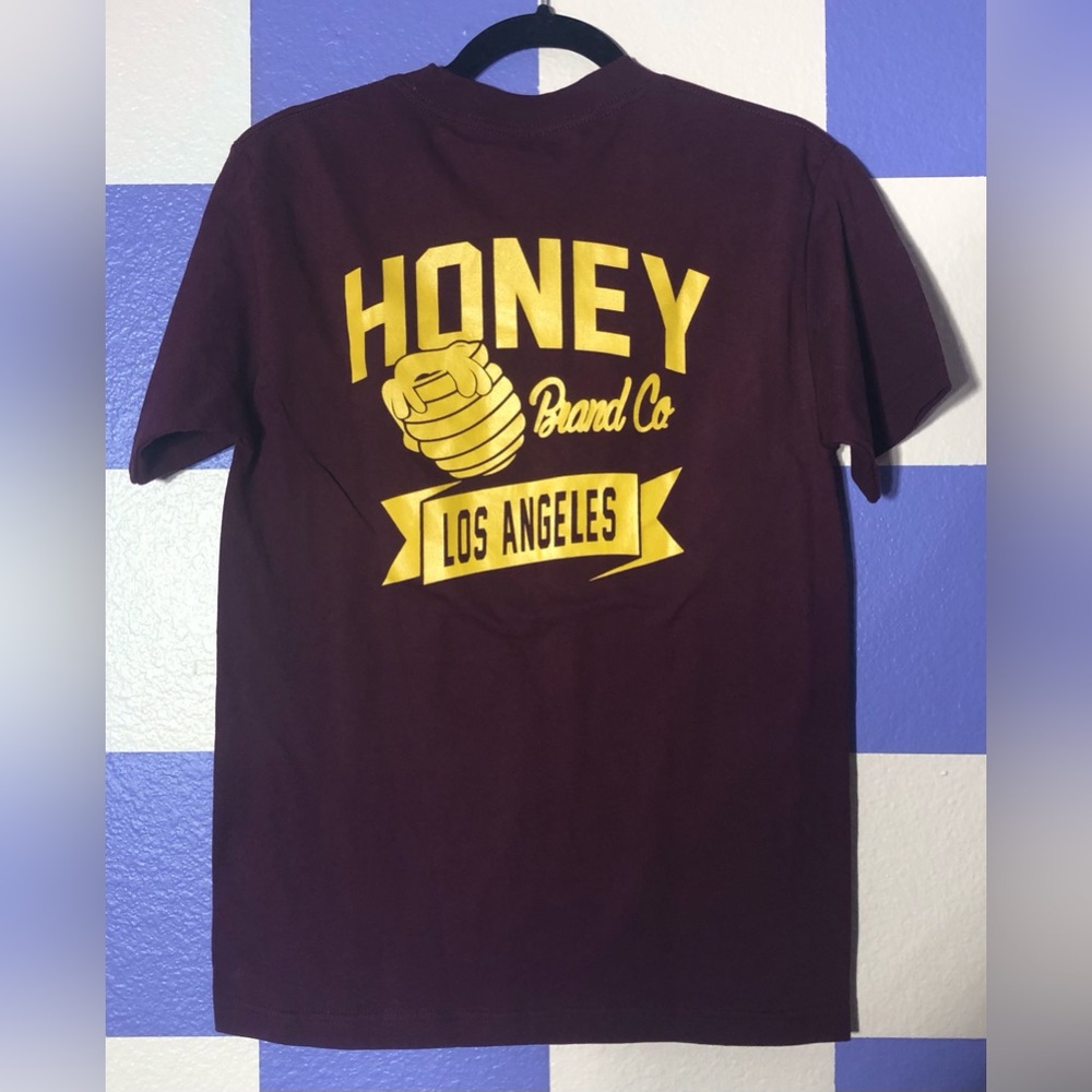 NWOT Honey Graphic Tee Front Left Corner and Back Burgundy and Yellow - Size S